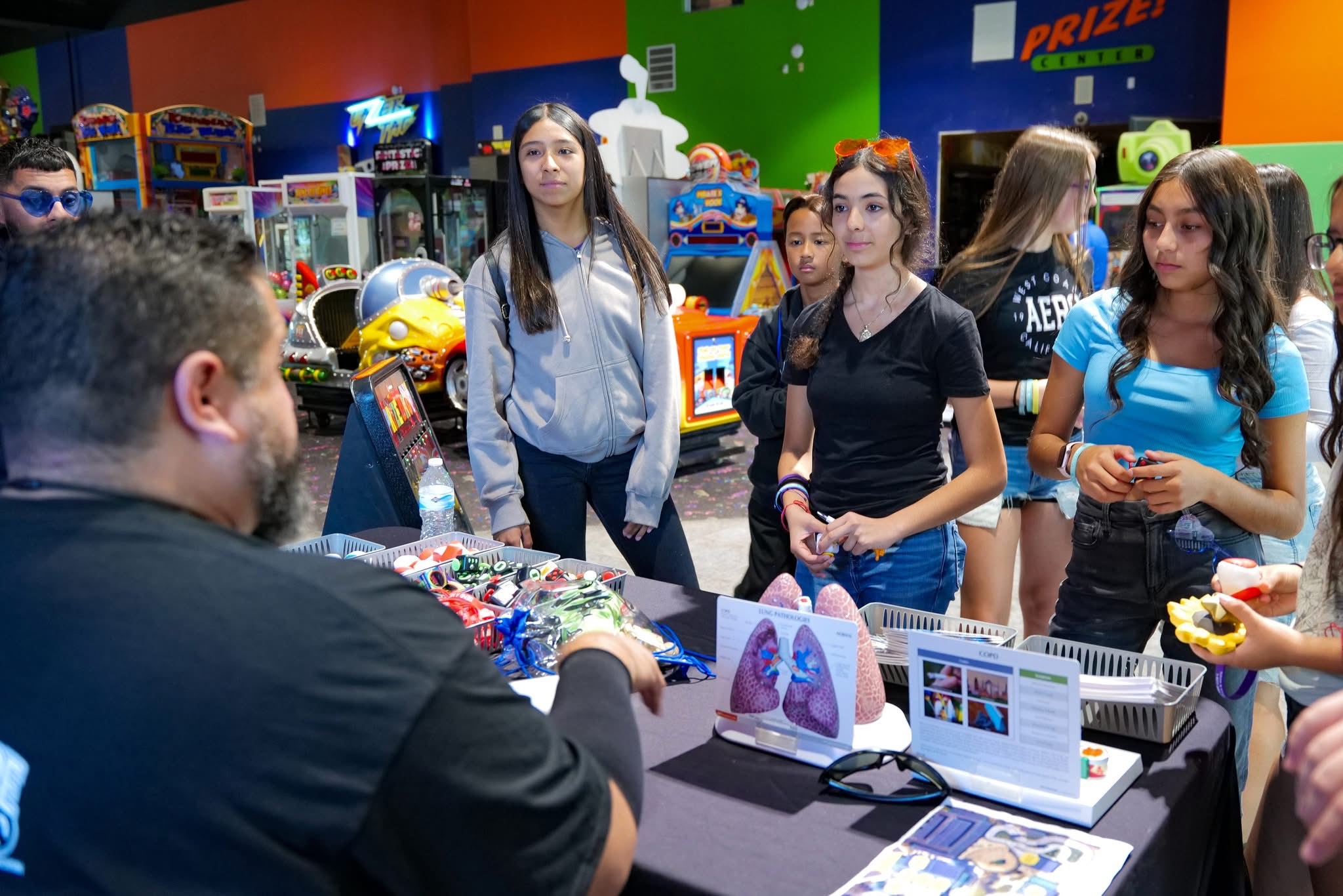 students at TUPE booth