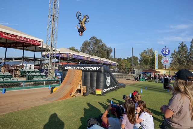 Dirt bike riders performing at Red Ribbon Event.