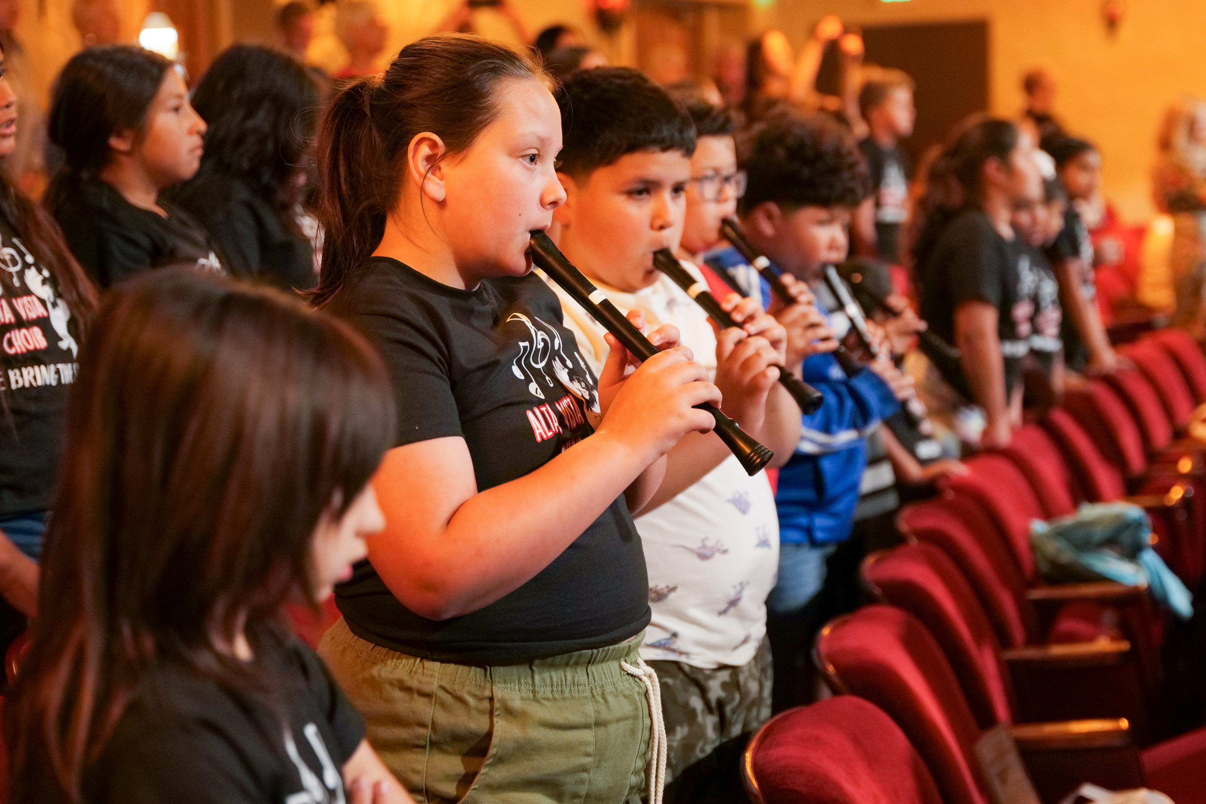 Students playing recorders