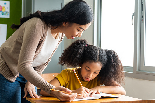 Stock photo of teacher and student