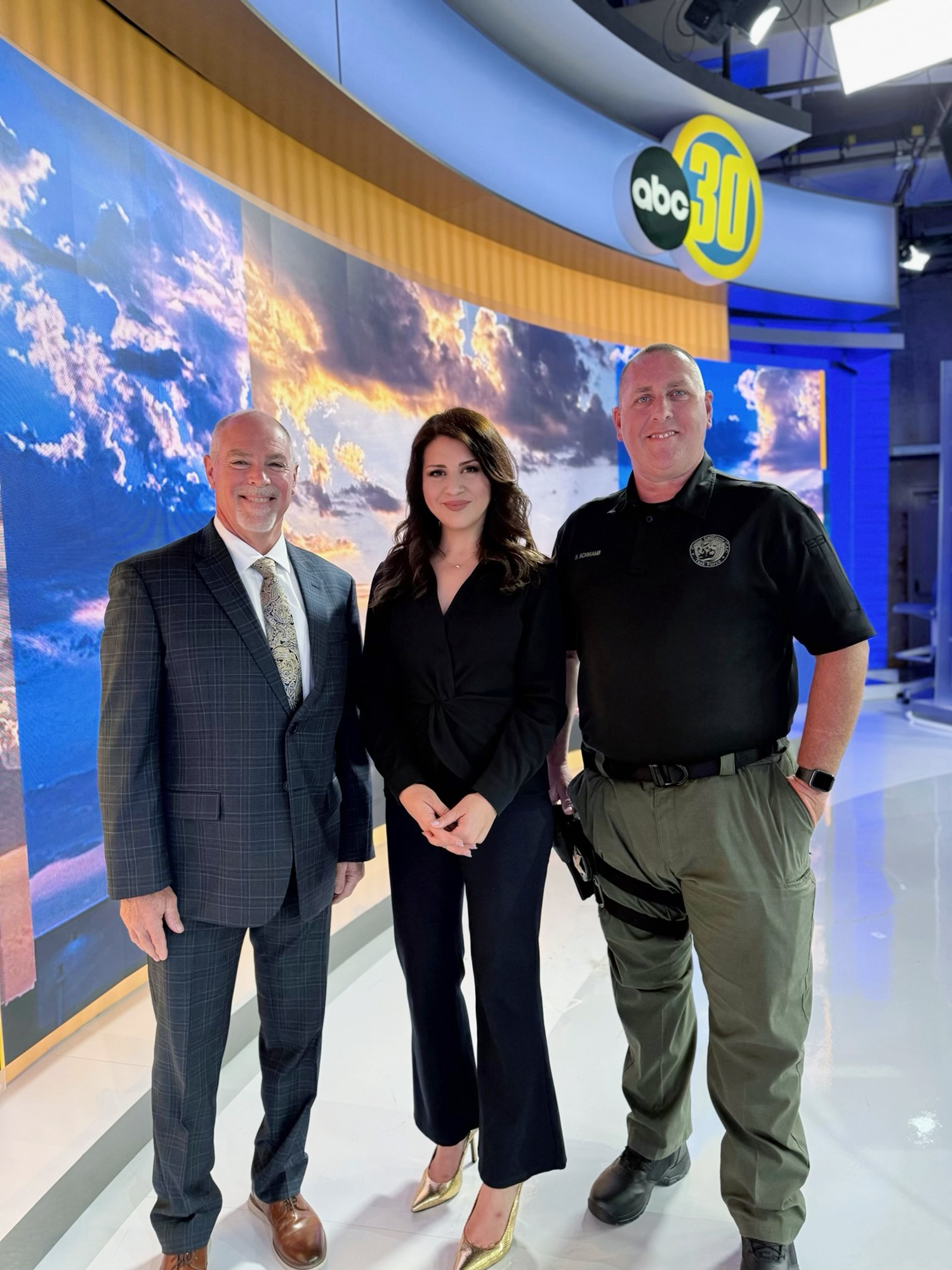Tim Hire, Graciela Moreno, and Sgt. Scott Schwamb