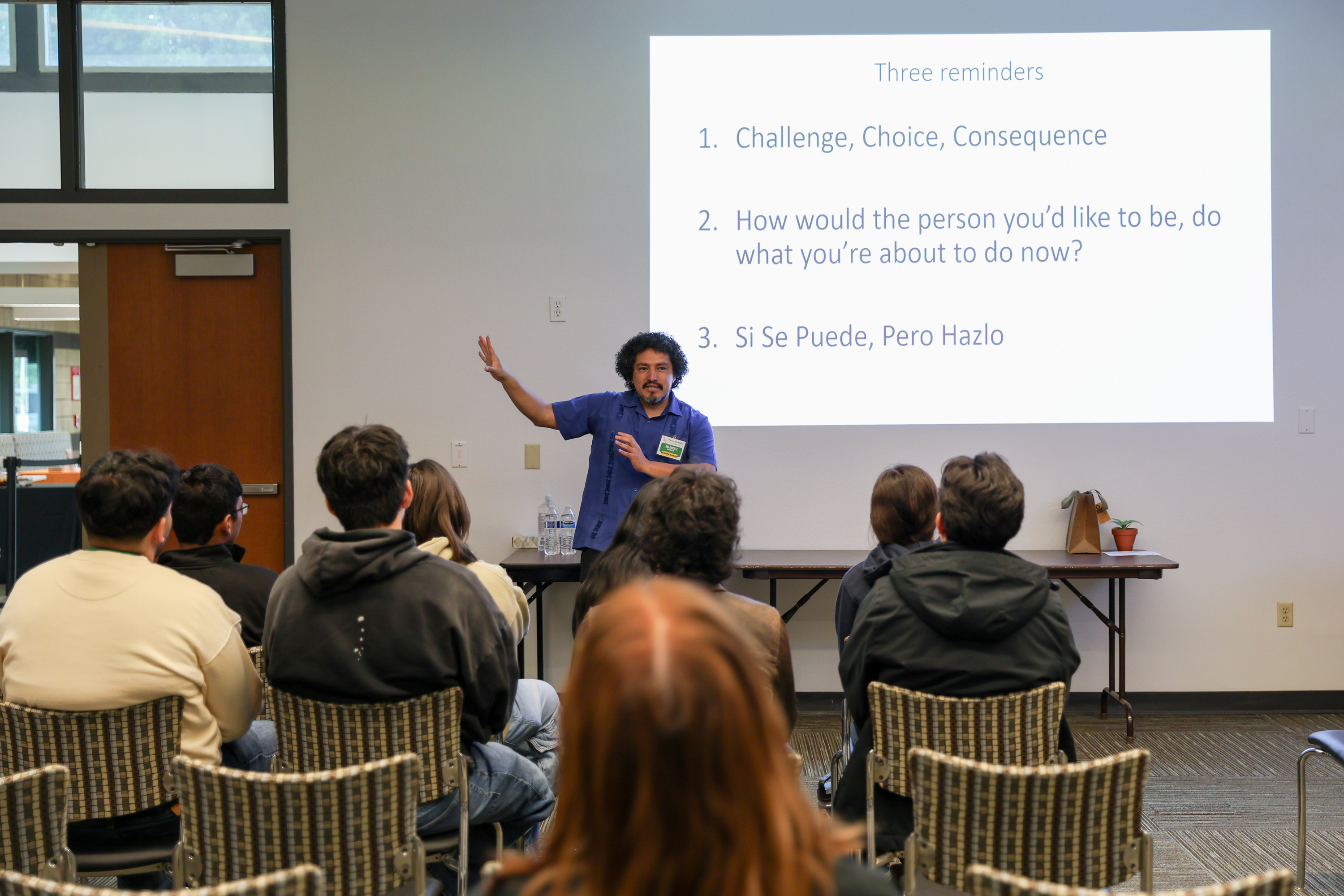 man presenting during session