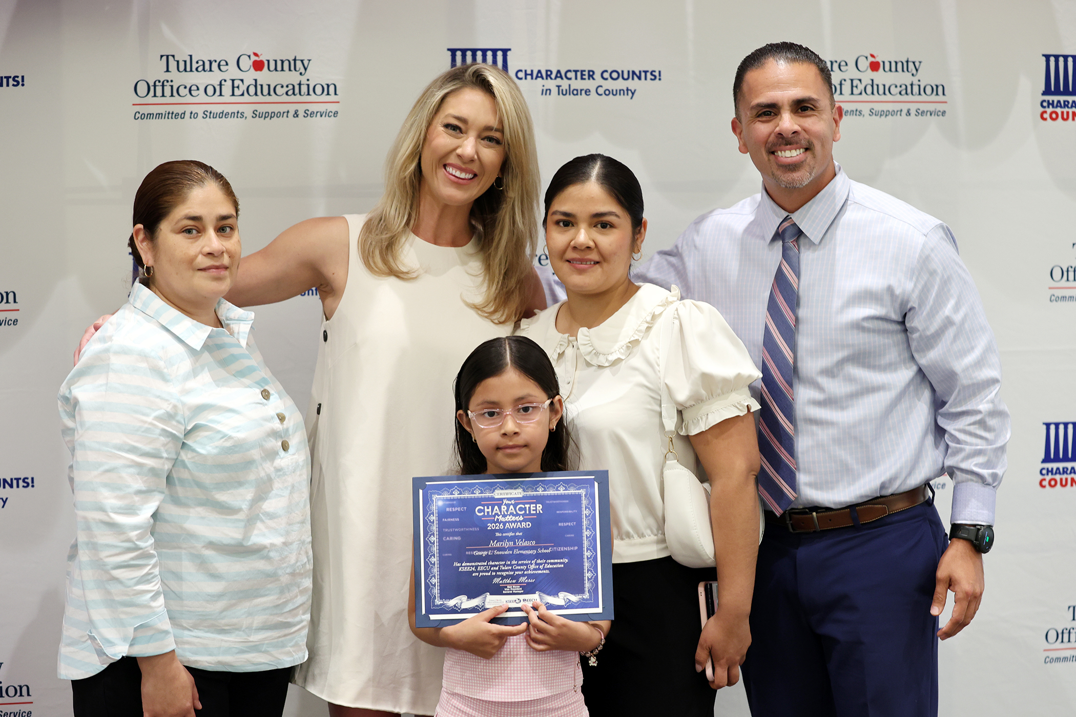 Student Marilyn Velasco and family at awards ceremony