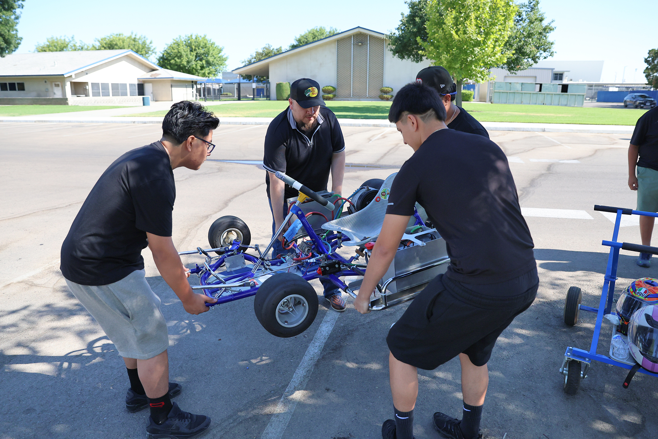 students lift go-kart