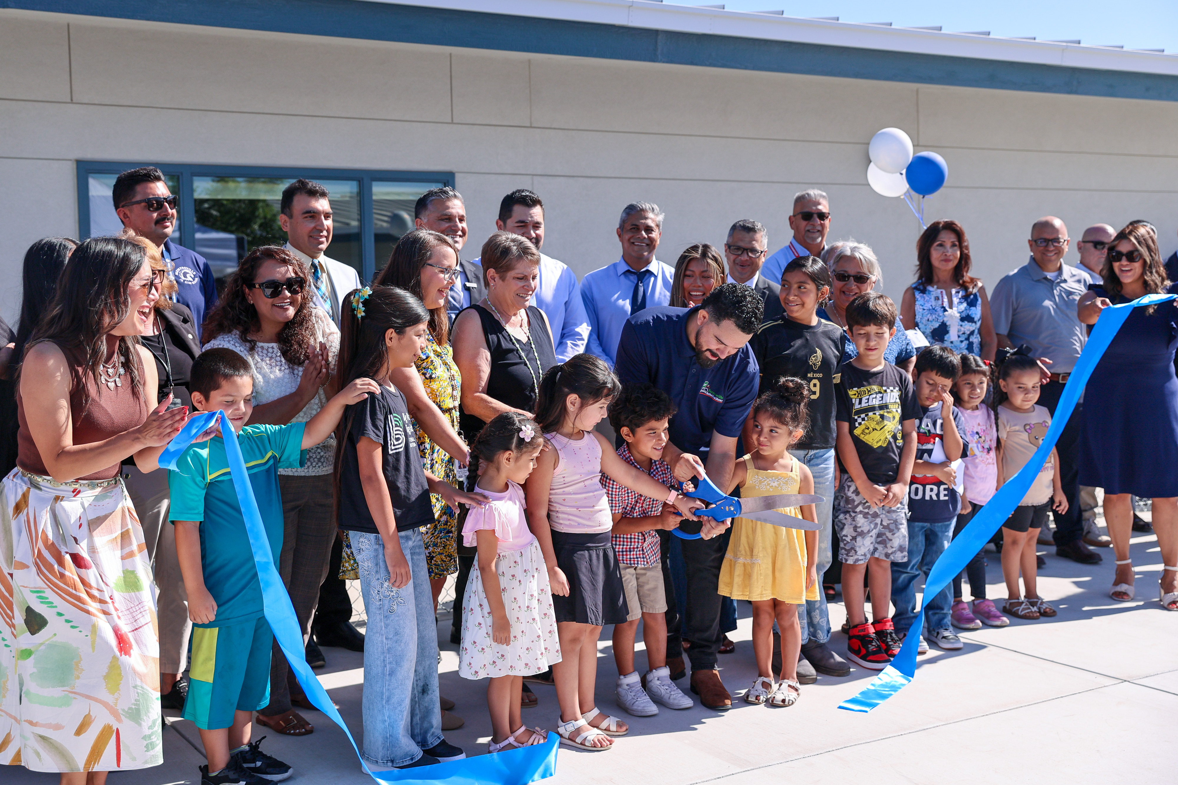 Hester ribbon cutting