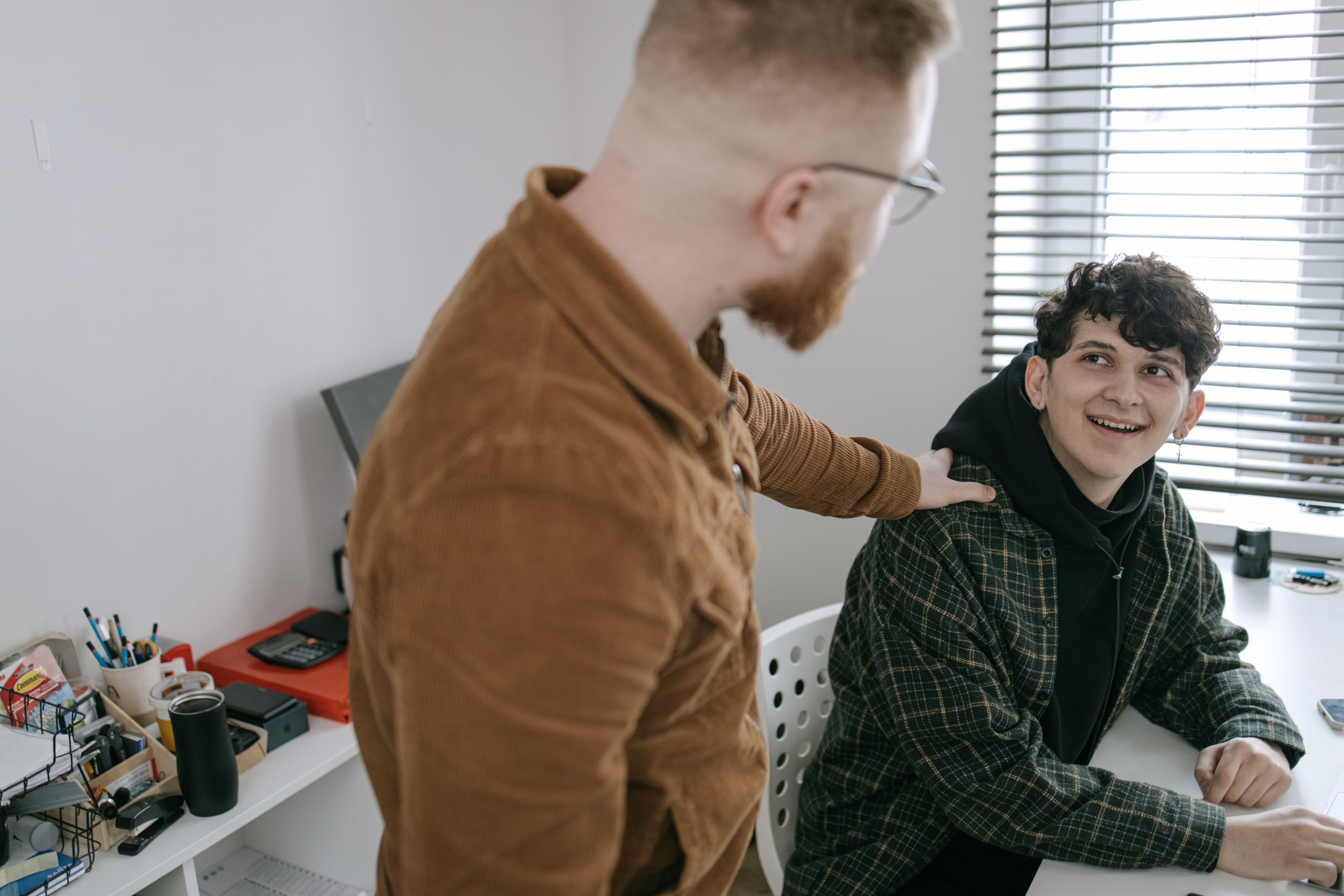 stock image of adult and teen