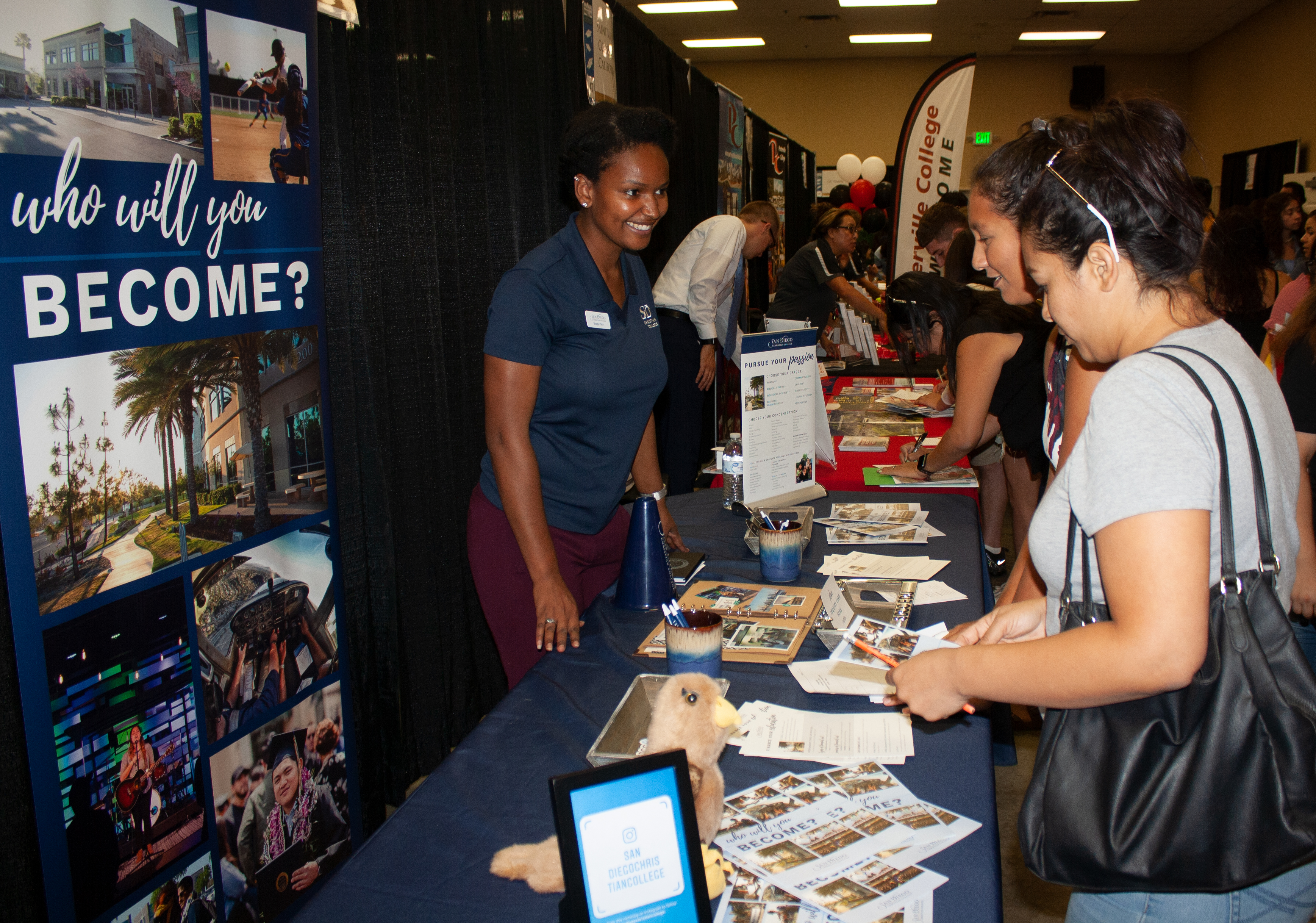 College representative talking to parent and student