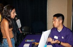 College representative talking to a student