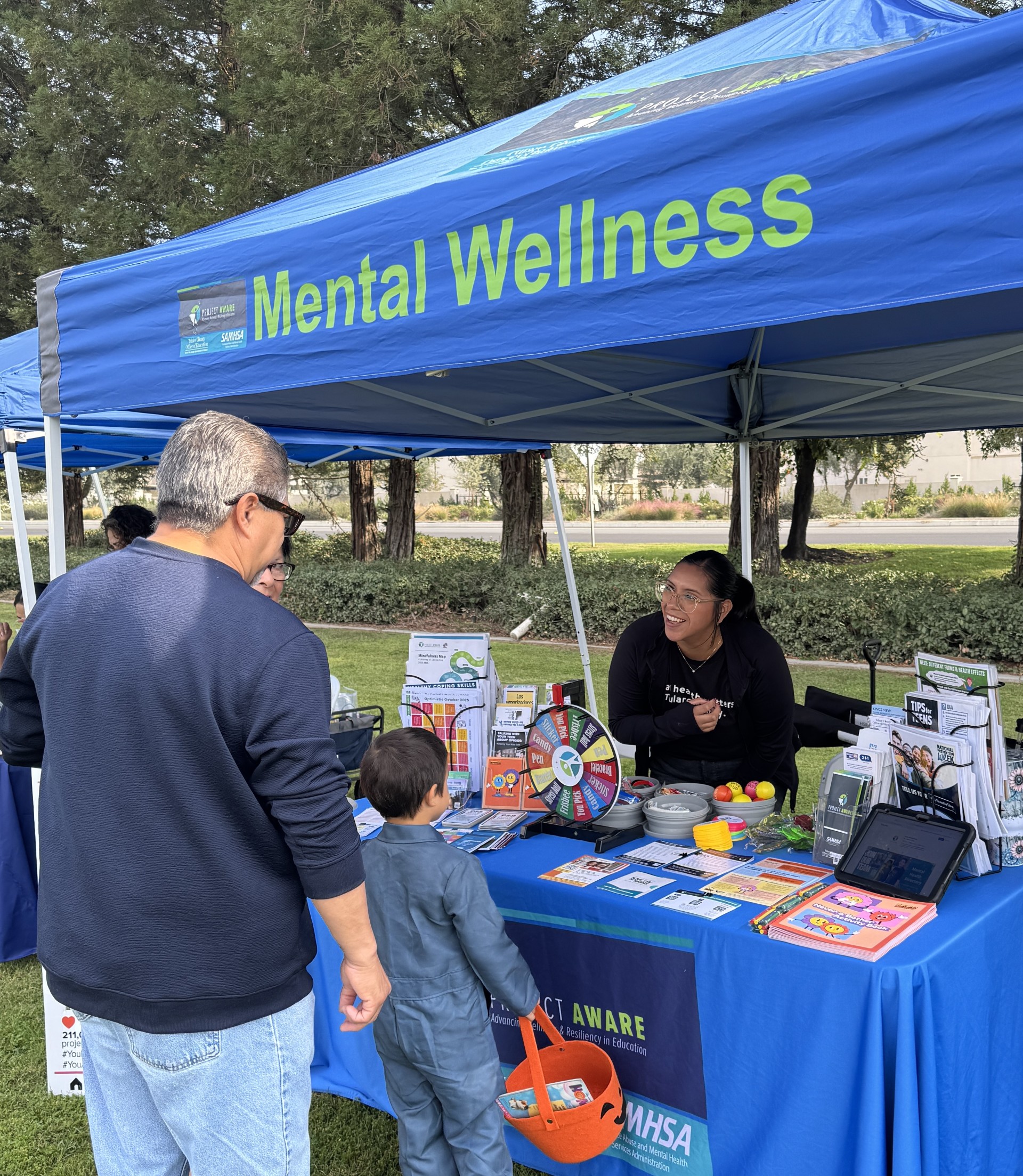 People at Project AWARE booth