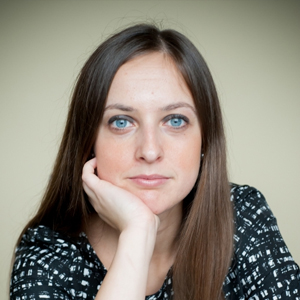 Woman with long hair resting chin